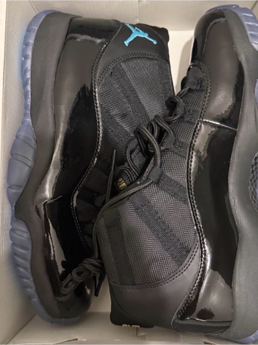 Jordan Men’s Black Sneakers with Blue Jumpman Accent